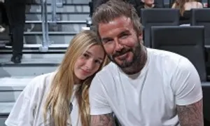 Con gái Beckham gây chú ý khi đi xem bóng rổ cùng bố